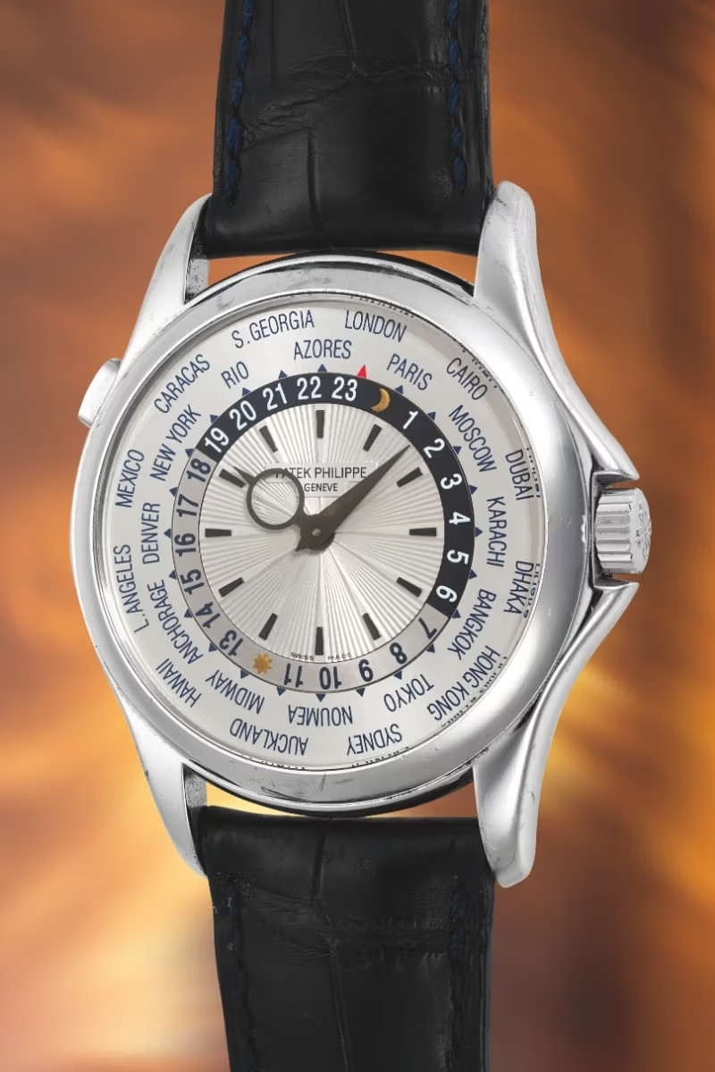 Patek Philippe World Time ref. 5130G. Эстимейт: $15,000 - 30,000 Patek Philippe World Time ref. 5130G. Эстимейт: $15,000 - 30,000